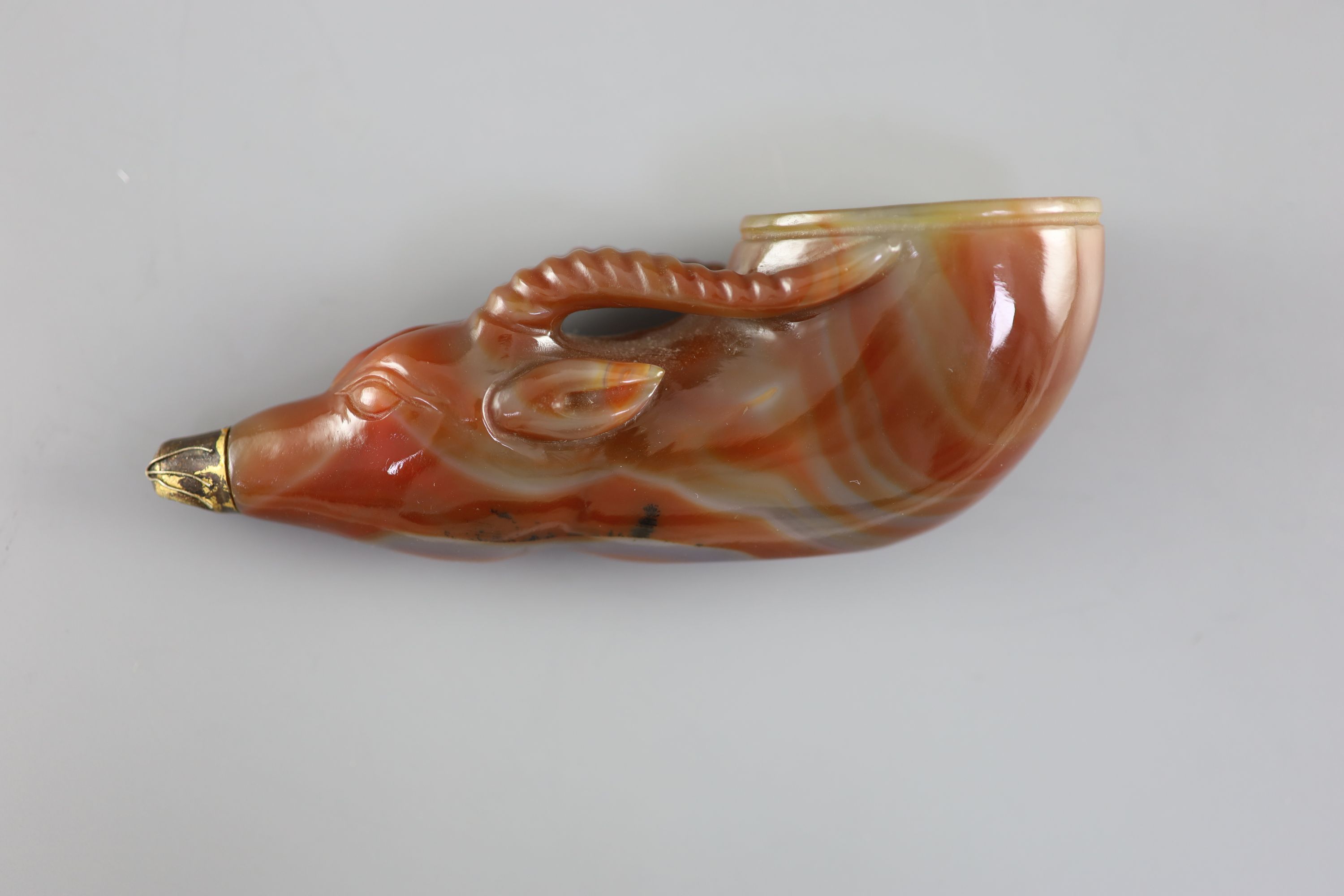 A Chinese chalcedony 'antelope' rhyton, late Qing dynasty, 14.5 cm long